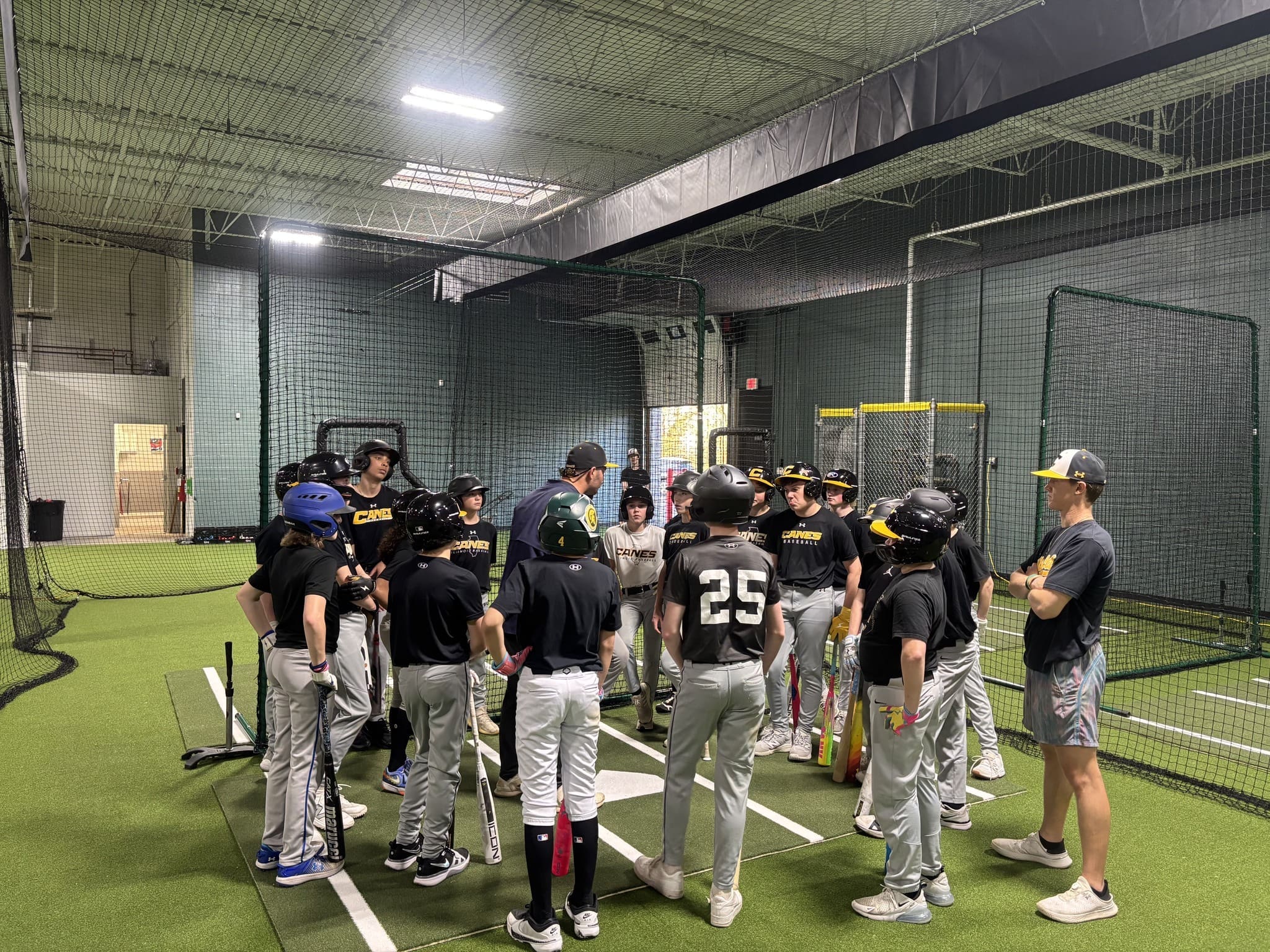 Canes Illinois Players Getting Ready to Hit at the Mount Prospect Facility