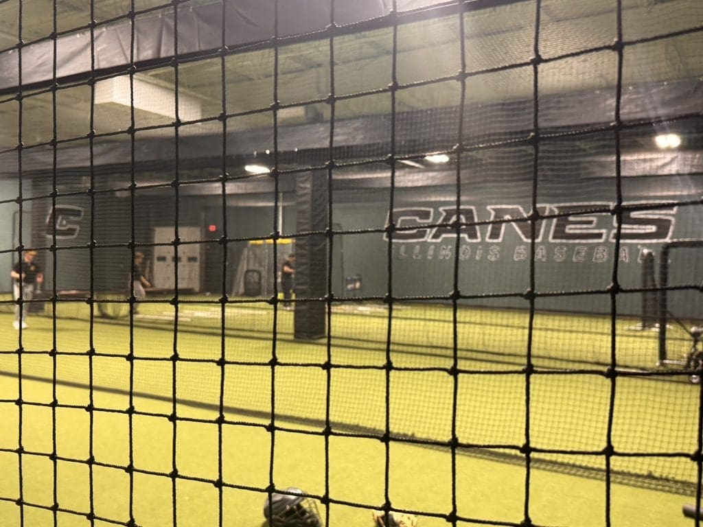 Players training in the batting cages at Canes Illinois Mount Prospect