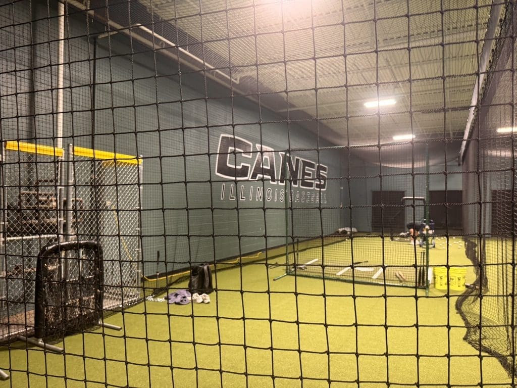 A batting cage against the Canes Illinois wall at the Mount Prospect facility